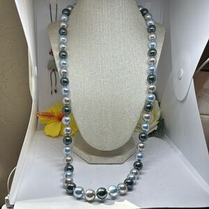 12mm Swarovski crystal tri color pearl necklace.  Hand knotted without clasp